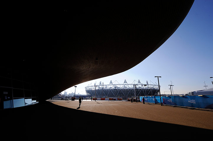Diving Thursday: The front of the aquatics centre with the main Olympic Stadium behind