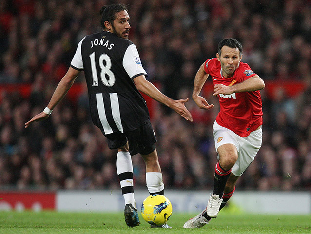 Giggs: Ryan Giggs skins Newcastle's Jonas Gutierrez