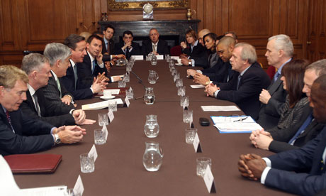 David Cameron (fourth left) hosts a football anti-discrimination summit