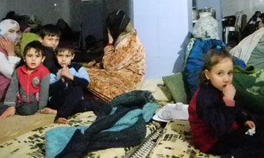 Children trapped inside the bomb shelter in Homs, Syria