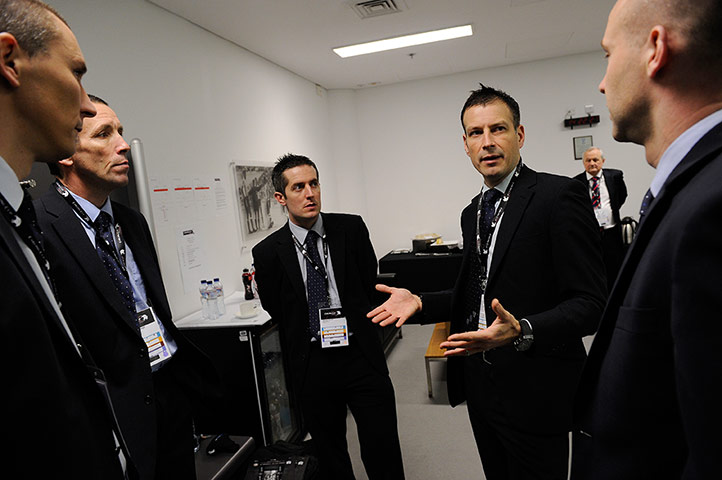CARLING CUP FINAL: 2012 Carling Cup Final ref Mark Clattenburg talks to fellow match officials