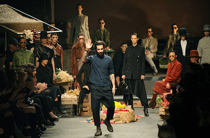 Milan fashion week: Designer Umit Benan greets the audience at the end of the Trussardi show