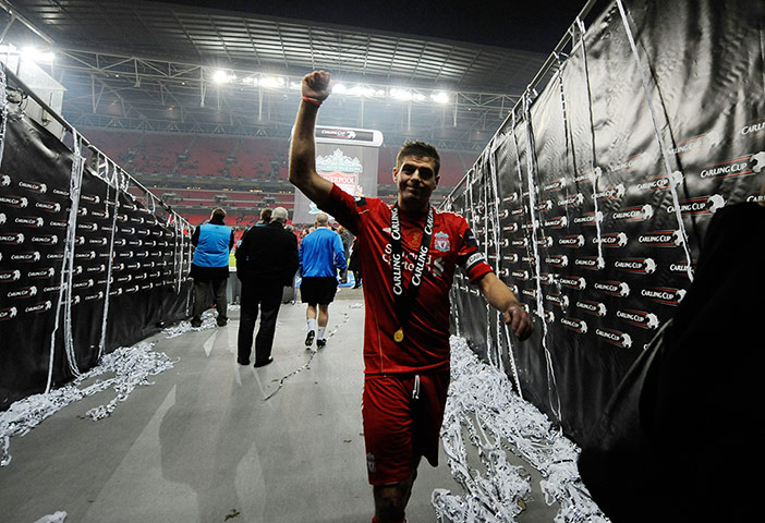 2012 Carling Cup Final: A happy Gerrard walks back down the tunnel 