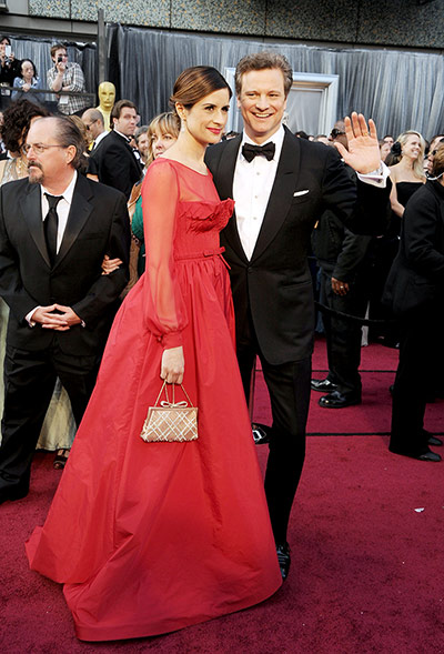 Oscars red carpet: Colin Firth in recycled Tom Ford, with Livia Giuggioli, in eco Valentino