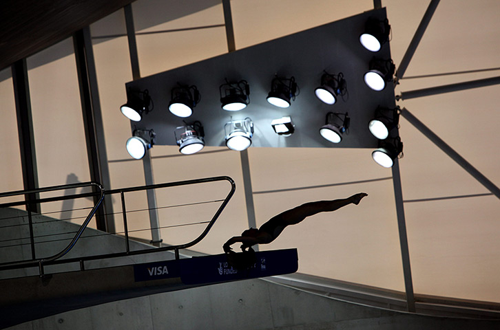 24 hours in pictures: A diver competes during FINA Diving World Cup, London