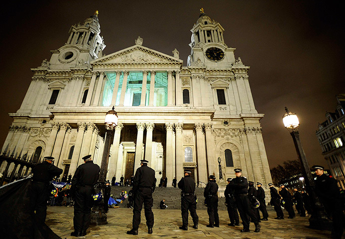 Occupy London eviction: Riot police stand guard as they prepare to remove protesters