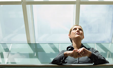 Businesswoman looking up