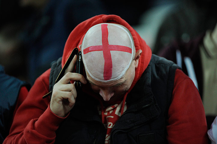 England  v Holland: England fan with painted bald head