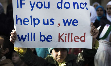 An anti-regime demonstrator in the city of al-Qsair