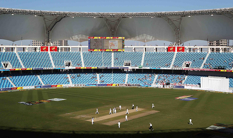 Pakistan v England: Pakistan players celebrates the wicket of England's James Anderson 