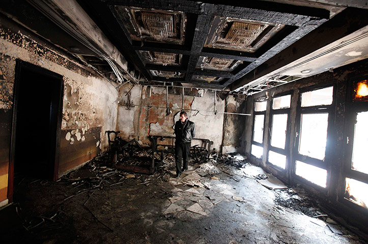 Egypt Protests: The burnt walls of the Syrian embassy seen after the building was ransacked