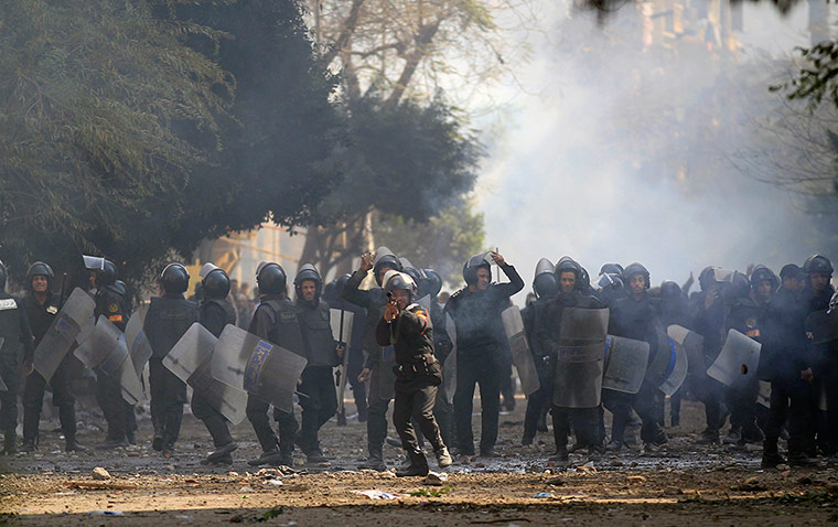 Egypt Protests: Egyptian security forces fire tear gas at protesters