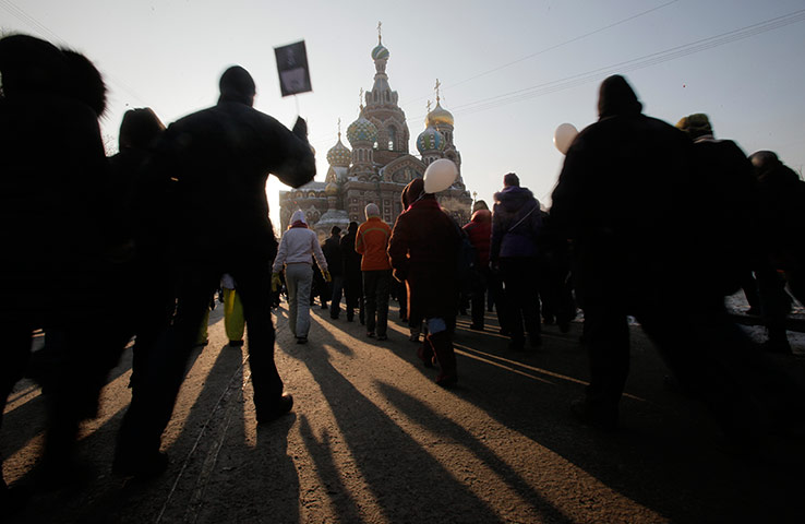Russia Protest: Demonstrators  march during a massive protest against Vladimir Putin