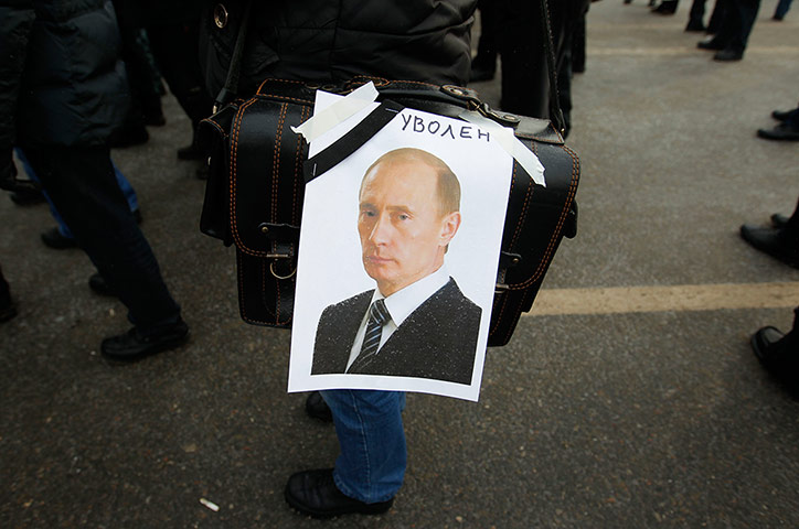 Russia Protest: A portrait of Russian Prime Minister Vladimir Putin with the word 'sacked'