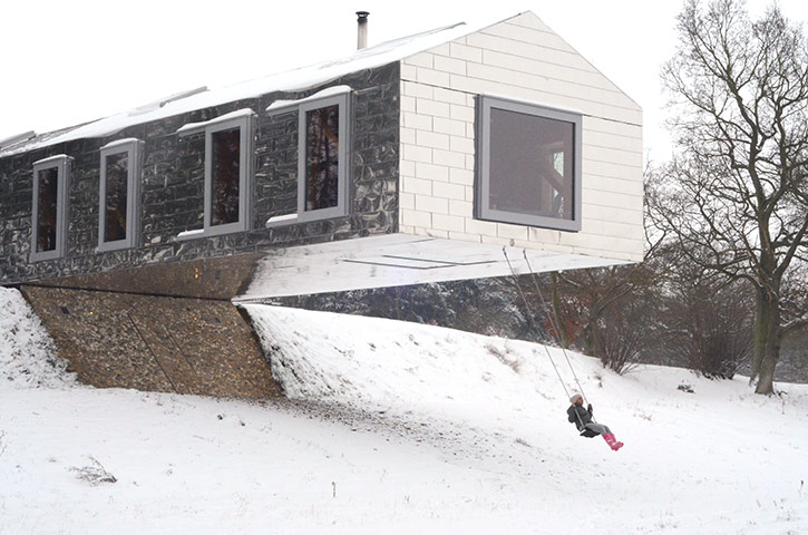 Readers snow pictures: Early morning snow swing at the balancing barn in Suffolk