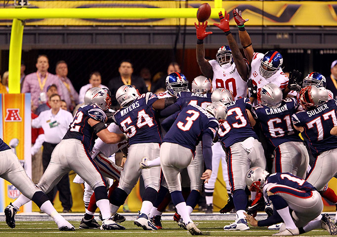 Superbowl: Stephen Gostkowski #3 of the New England Patriots kicks a field goal