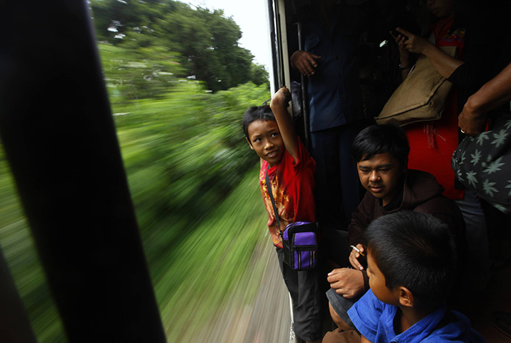 24 hours: Jakarta, Indonesia: Surianto, a homeless boy, on a commuter train 