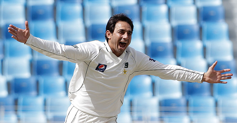 Third test: Pakistan's bowler Saeed Ajmal celebrates taking a wicket against England 