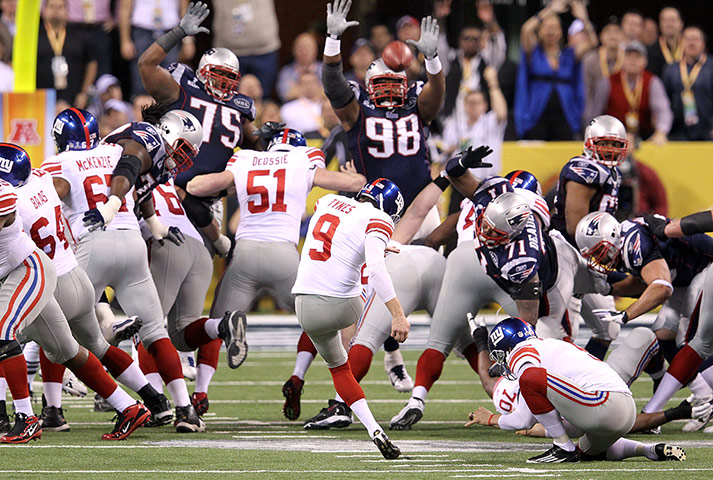 Superbowl replacements: Lawrence Tynes of the New York Giants kicks a 38 Yard field goal