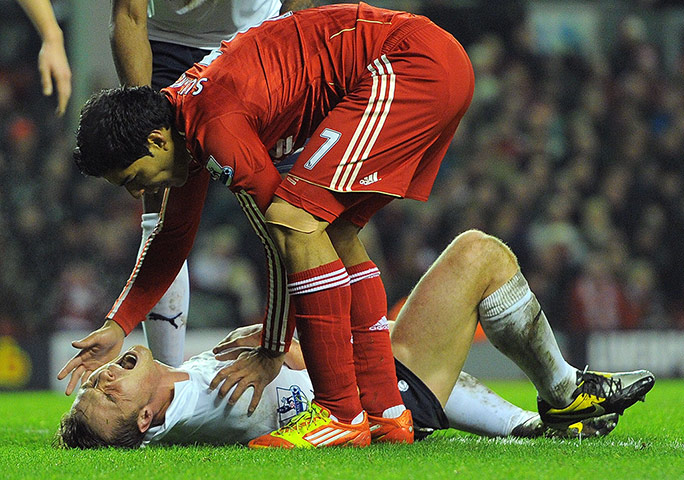 Liverpool v Spurs: Tottenham Hotspur's Scott Parker is fouled byLiverpool's Luis Suarez