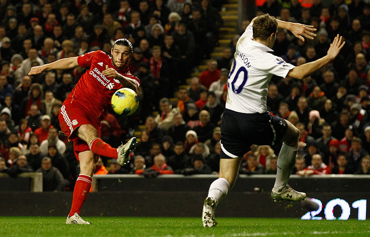 Liverpool v Spurs: Liverpool's Andy Carrolll has a shot at goal against Tottenham