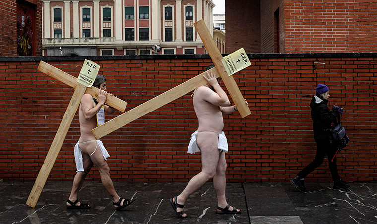 24 hours in pictures: Barakaldo, Spain: Volunteers from the pressure group Berri-Otxoak