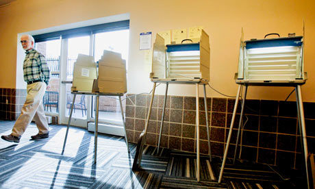 Election officia walks around the empty polling room at The Heights in St Louis, Missouri.