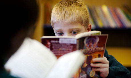 A child reading in the library at a primary school