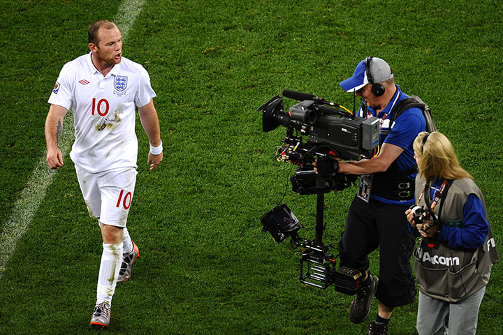 2. resignation of Capello: England's striker Wayne Rooney talks to