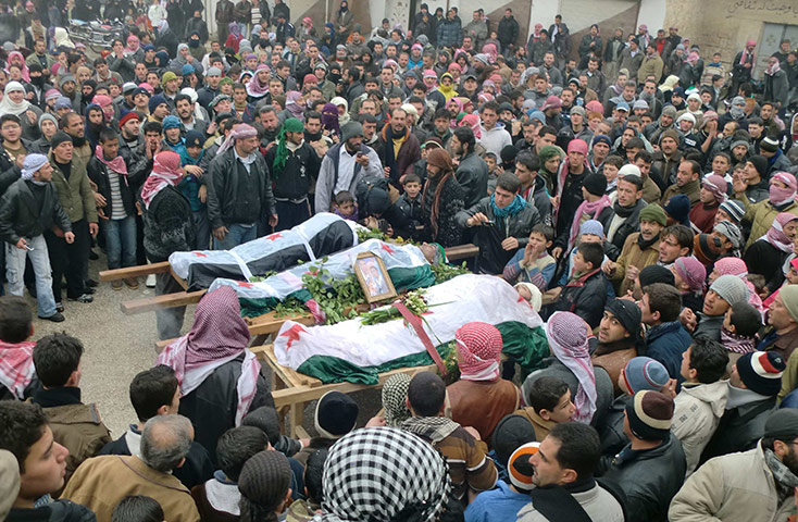 Syria clashes: Anti-government demonstrators attend the funeral in Idlib