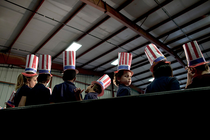 24 hours in pictures: Children from Peachtree Academy wait for Newt Gingrich