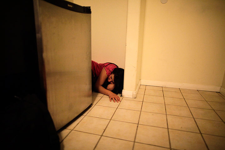 24 Hours: Melinda Guzman lies in the corner of in a motel room in Port Hueneme