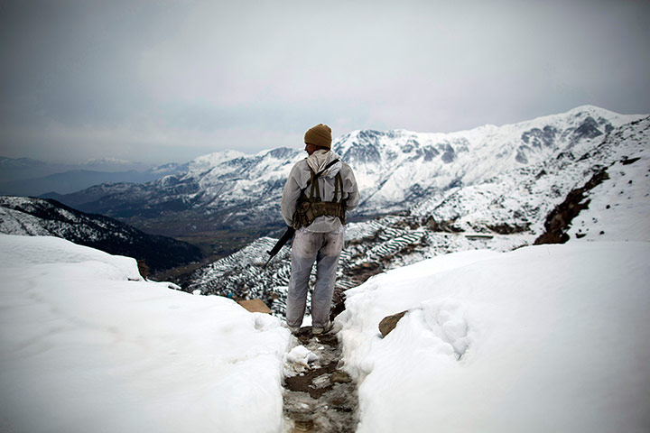 Featured Photojournalist: A soldier patrols near Kalpani Base