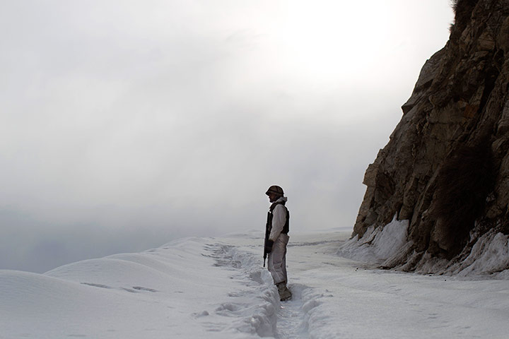 Featured Photojournalist: A soldier on patrol near the Kalpani base