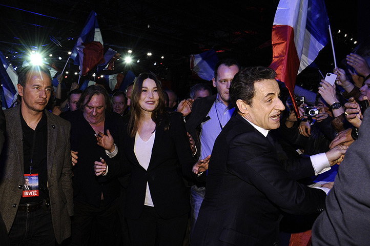 Sarkozy rally: Nicolas Sarkozy leaves with Carla Bruni Sarkozy and actor Gerard Depardieu 