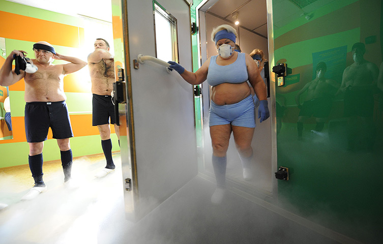 24 hours in pictures: Participants exit the cryotherapy room, Poland