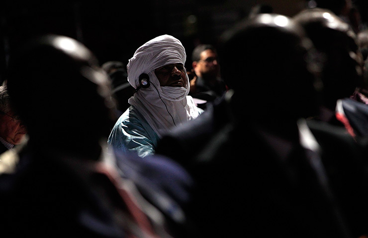 24 hours in pictures: A participant listens to a speech at the 6th World water forum in Marseille