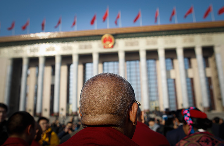 24 hours in pictures: A Tibetan monk at Chinese People's Political Consultative Conference