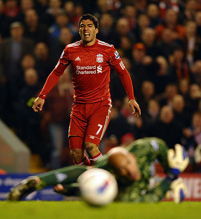 Liverpool v Everton: Luis Suarez agonizes after he puts his shot wide of the Everton goal 