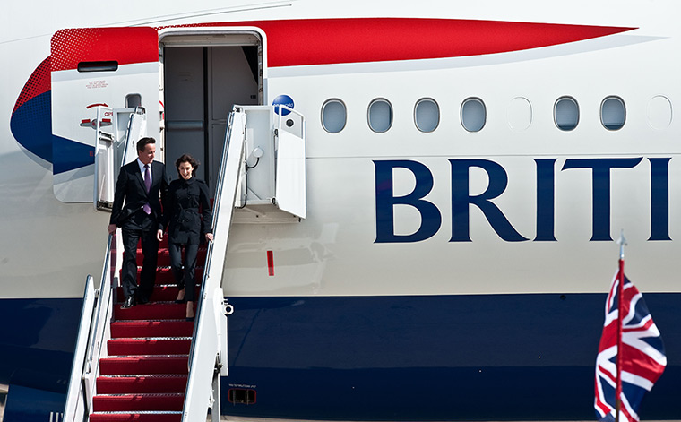 Camerons in US: David Cameron and Samantha disembark from their plane in Maryland