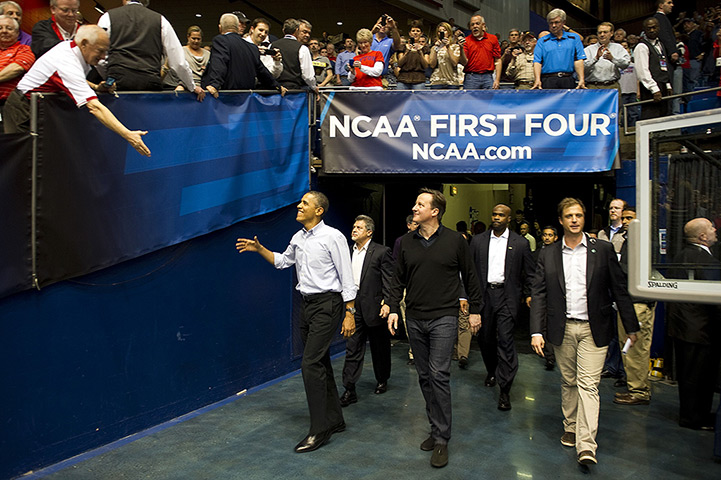 Camerons in US: Barack Obama and David Cameron arrive at University of Dayton Arena