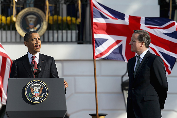 Cameron in US: Barack Obama speaks as David Cameron  looks on during the ceremony