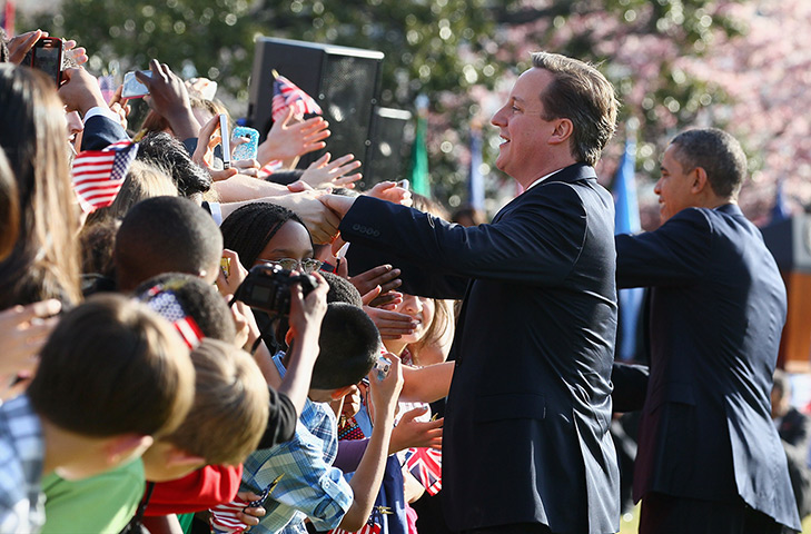 Cameron in US: Barack Obama and David Cameron greet the crowd