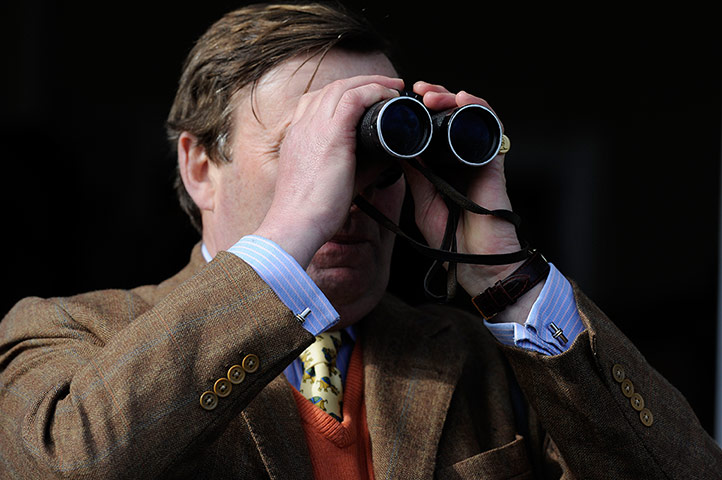 Cheltenham day 2: Trainer Nicky Henderson watches the action at Cheltenham