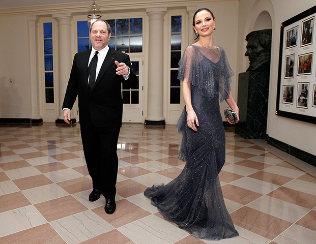 State dinner fashion: Hollywood film producer Harvey Weinstein walks with Georgina Chapman