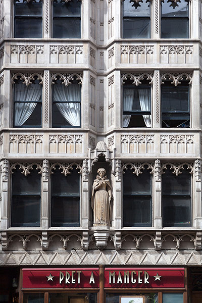 Unusual chain restaurants: Ornate Building Facade with Pret a Manger Cafe beneath Strand London UK
