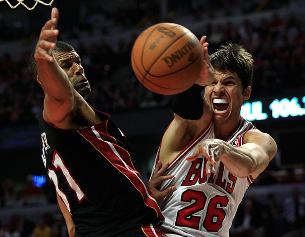 Best of the week: Chicago Bulls' Kyle Korver makes a pass against Miami Heat's Shane Battier 