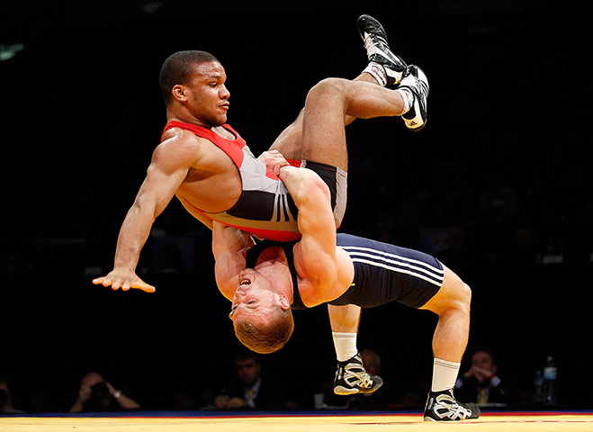 Best of the week: Zhan Bleniuk of Ukraine gets thrown by Laimutis Adomaitis of Lithuania