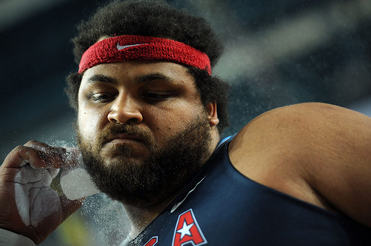 Best of the week: Reese Hoffa of the USA chalks up ahead of the men's shot putt final