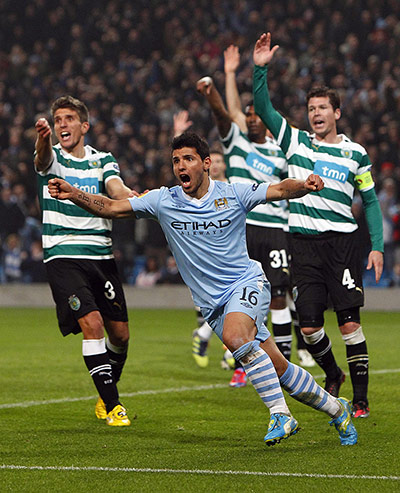 City v Sporting: Sergio Agüero celebrates scoring against Sporting Lisbone